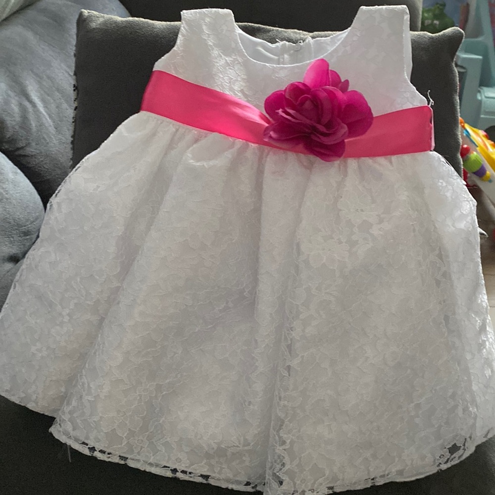 Beautiful White Lace dress with pink ribbon and flower